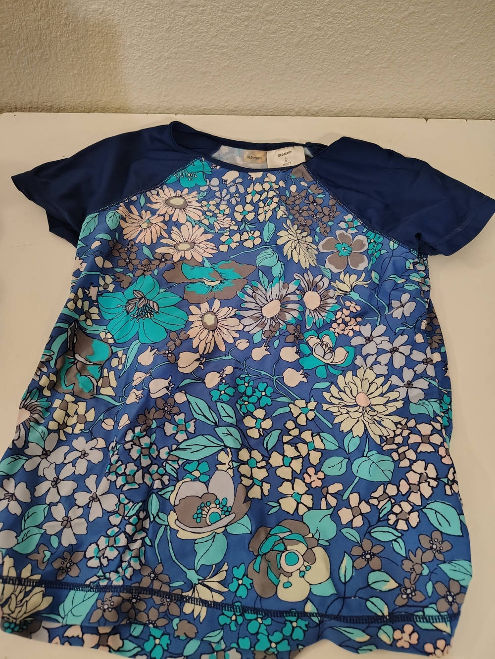 Old Navy Girls Blue Floral Short Sleeve Rashguard Top Large 10-12 Swim Shirt